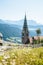 Church on a mountain overlooking valley in Villandro, Dolomites, Italy