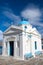 Church in Mykonos, Greece. Temple building with blue dome with nice architecture. Agios Nikolaos church on sunny sky