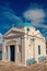 Church in Mykonos, Greece. Temple building with blue dome with nice architecture. Agios Nikolaos church on sunny sky