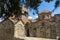 Church in Mystras. Mystras or Mistras is a fortified town in Laconia, Peloponnese, Greece. It served as the capital of the