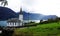 Church of Nes at the Lusterfjord in autumn in Norway