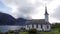 Church of Nes at the Lusterfjord in autumn in Norway