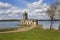 Church next to a lake in spring in England