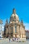 Church of Our Lady at Neumarkt square in downtown of Dresden in summer sunny day and blue sky with many tourists, Germany