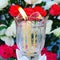 Church Prayer Candle With Fresh Rose Flowers