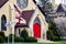 Church with Red Doors and American Flag