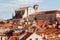 Church among red terra cotta tile roofs in the old town of Dubrovnik