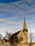 Church Reflected in River