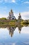 Church reflected in water