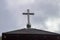 Church Roof with a cross. Church building roof with holy cross