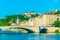 Church of Saint George viewed behind pont Bonaparte in Lyon, France