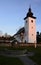 Church of Saint John The Baptist and stone marking geographical center of Europe in Kremnicke Bane, Slovakia