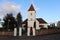 Church of Saint Michael in the Latvian village of Alsunga at sunset in October 2020