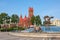 Church Of Saints Simon also known as the Red Church and fountain with name of belarusian city Brest on it at Independence Square I