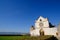 Church of San Francesco in Assisi with the stone wall. The basilica built in Gothic style houses the frescoes by Giotto