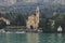 Church San Lorenzo with harbour in Tremezzo Cadenabbia with bank promenade in Lake Como