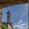 The Church of Santa Croce framed by the walls of the Conti Guidi castle, historic center of Vinci, Florence, Italy