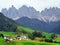 The church Santa Maddalena with the impressive Odle Mountains Group in the background at sunset.