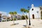 The church is in Sitges town and trees