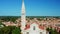 Church of St. Euphemia surrounded by lush trees in Rovinj