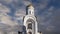 Church of St George on Poklonnaya hill  on the background of moving clouds, Moscow, Russia. Christ is Risen, Eternal memory of t