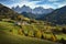 Church of St. Magdalena in front of the Geisler or Odle Dolomites mountain peaks. Val di Funes in South Tyrol. Italy.