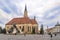 Church of St.Michael with statue of Matei Corvin in Cluj - Napoca