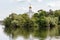 Church of St. Nicholas on Monastery Island in the trees on the bank of the river. Dnipro