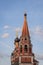 Church of St. Nicholas in Moscow. Red building with black domes. Orthodox church