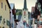 Church steeple rises above main street houses Garmisch Bavaria