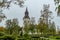 Church in Sweden with colorful autumn trees and a cemetery in front