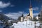 The church of Tarvisio during the winter with snow