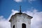 Church tower closep with black metal roof. relegious architecture