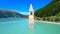 Church tower in Lake Reschen - South Tyrol - Italy - 4k drone photo