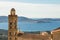 Church tower of Lumio with Calvi in background