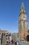 Church tower Martinitoren, people enjoy spring sun