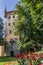 Church tower and red flowers in Warendorf