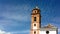 church tower and sky with nimbus