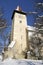 Church tower in winter transylvanian village