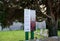 Church of the Transfiguration signage. & yew tree. Pyecombe, Sussex. UK