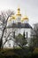 Church in the trees. Church. Old Church in Chernigov. Golden dome. History. Old City