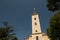 Church of Uznesenja BDM in Cetingrad, Croatia. New church after war in Croatia. Statue of virgin Mary with church tower in backgro