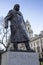 Churchill Statue shows Winston Churchill standing with his hand resting on his walking stick