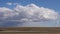 Churning Cumulus Clouds in Open Landscape