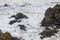 The churning waters of the Irish sea as waves break on the shore during a strong winter storm