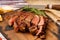 Churrasco of meat cut into pieces on a wooden board in a rustic setting. Close up, 45 deg. view