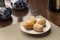 Churros pastry filled with dulce de leche on white plate