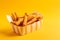 Churros tasty fast food street food for take away on yellow background