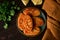 Chvishtari, corn flour tortillas with cheese, pastries, Georgian cuisine, Mchadi, homemade, top view, on a wooden table