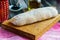 Ciabatta on the cutting board. Italian bread